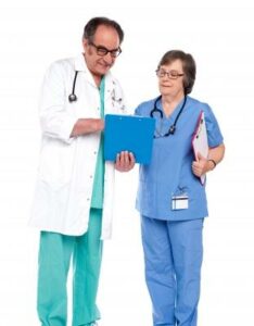 Doctors Discussing Medical Report_by stockimages